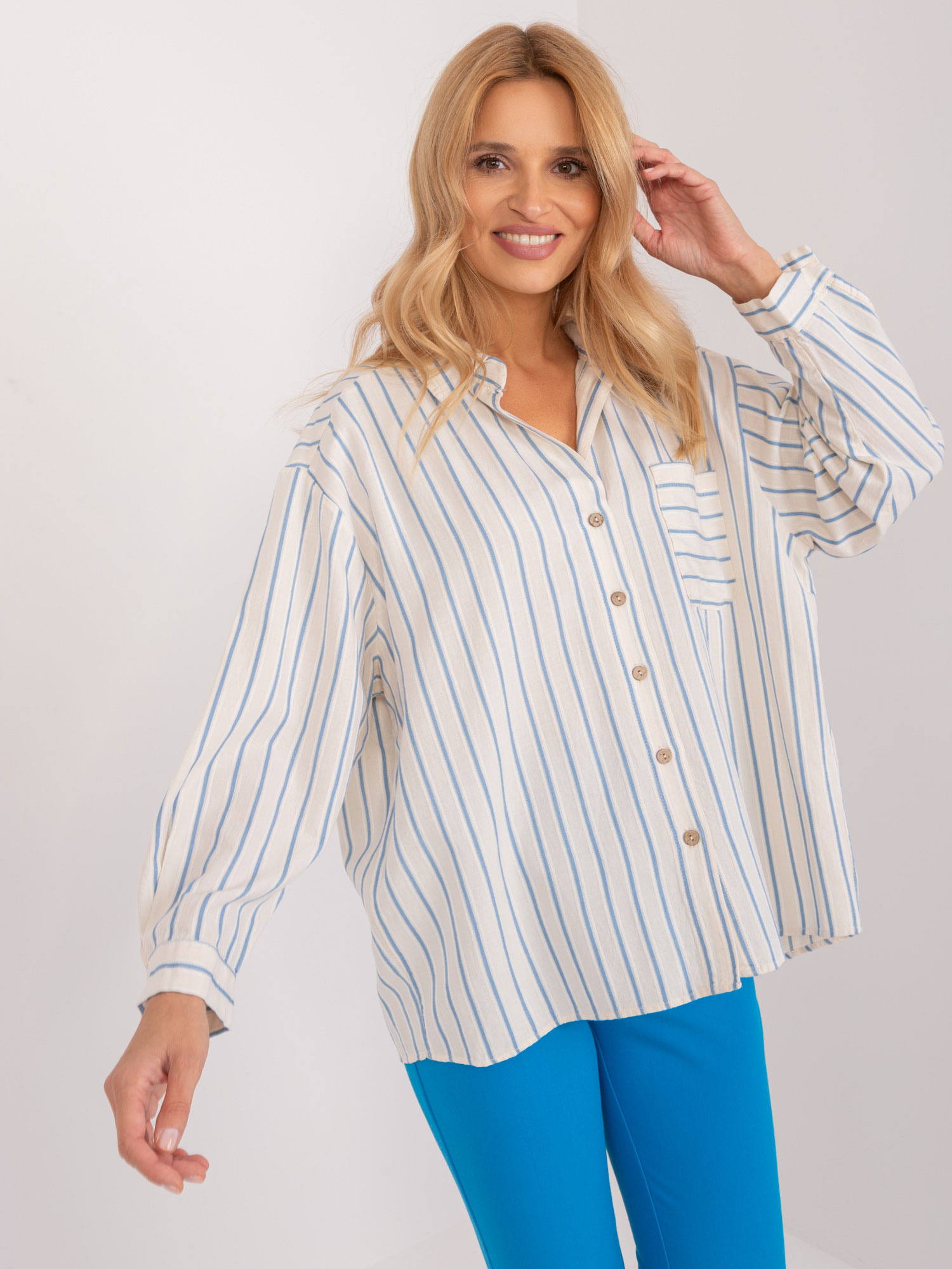Hurt Cream-blue oversized striped shirt.