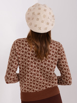 Hurtownia Jasnobeżowy damski beret z aplikacją