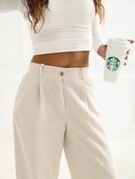 Jasnobeżowe sztruksowe spodnie typu carrot RUE PARIS