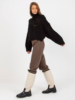 Hurtownia Czarny luźny sweter z golfem w ażurowy wzór