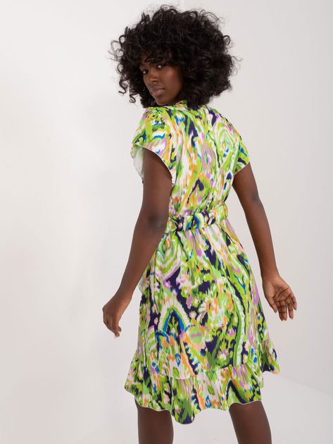 Hurtownia Jasnozielona sukienka z printami i falbaną