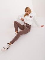 Großhandel Ecru Set aus Sportanzug mit Kapuzenpullover.