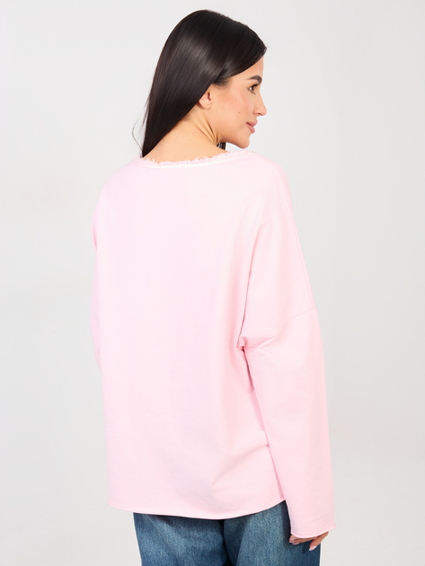 Jasnoróżowa damska bluzka oversize z kieszenią
