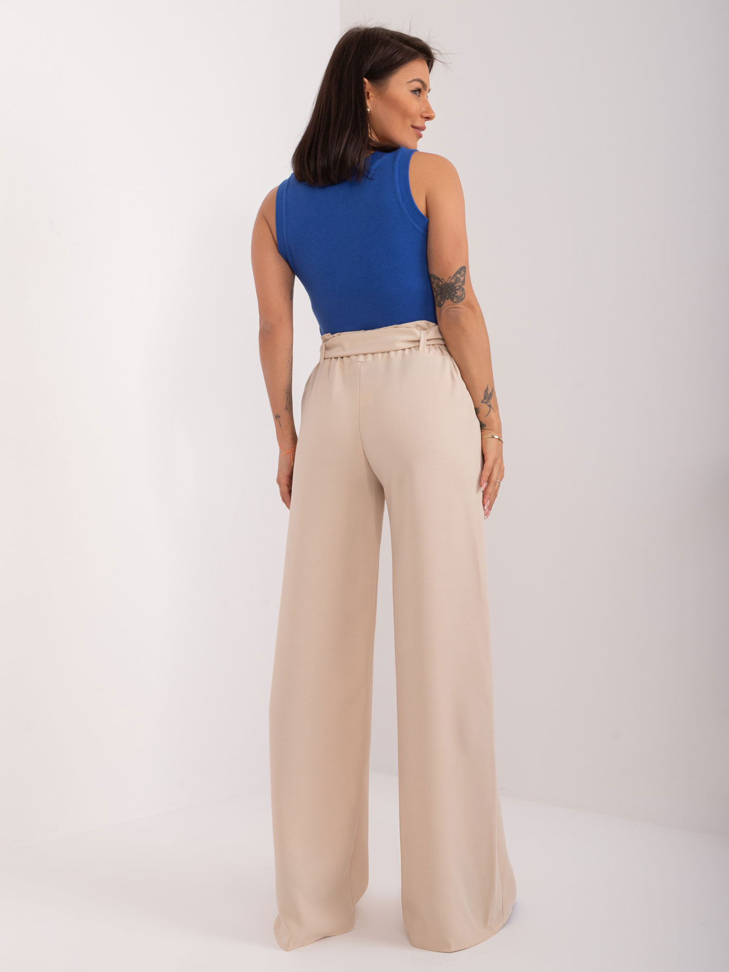 Hurt light beige fabric trousers swedes with a belt RUE PARIS.