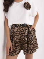 Ecru summer set with leopard print shorts.