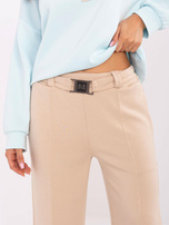 Hurt Beżowe dresowe spodnie z przeszyciem w kant