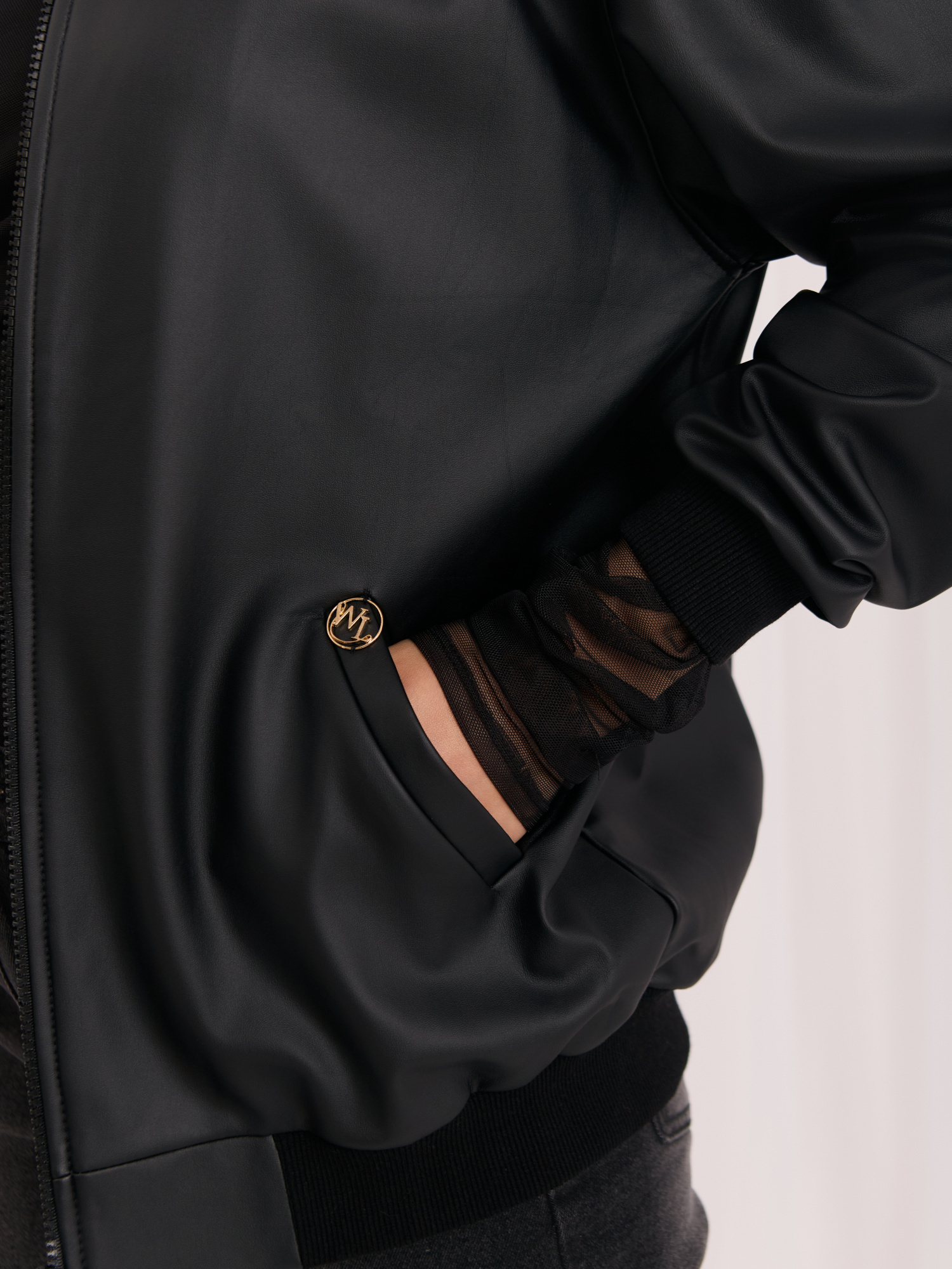 Black leather jacket with velvet lining.