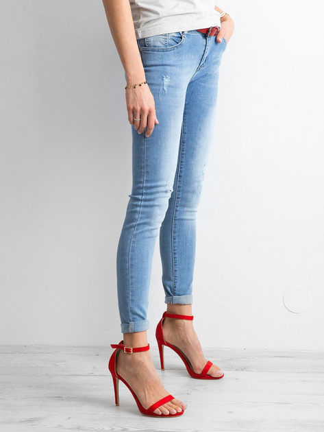 Damskie jeansy z przetarciami niebieskie