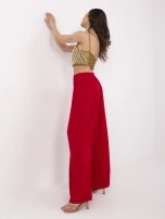 Red wide pleated pants.