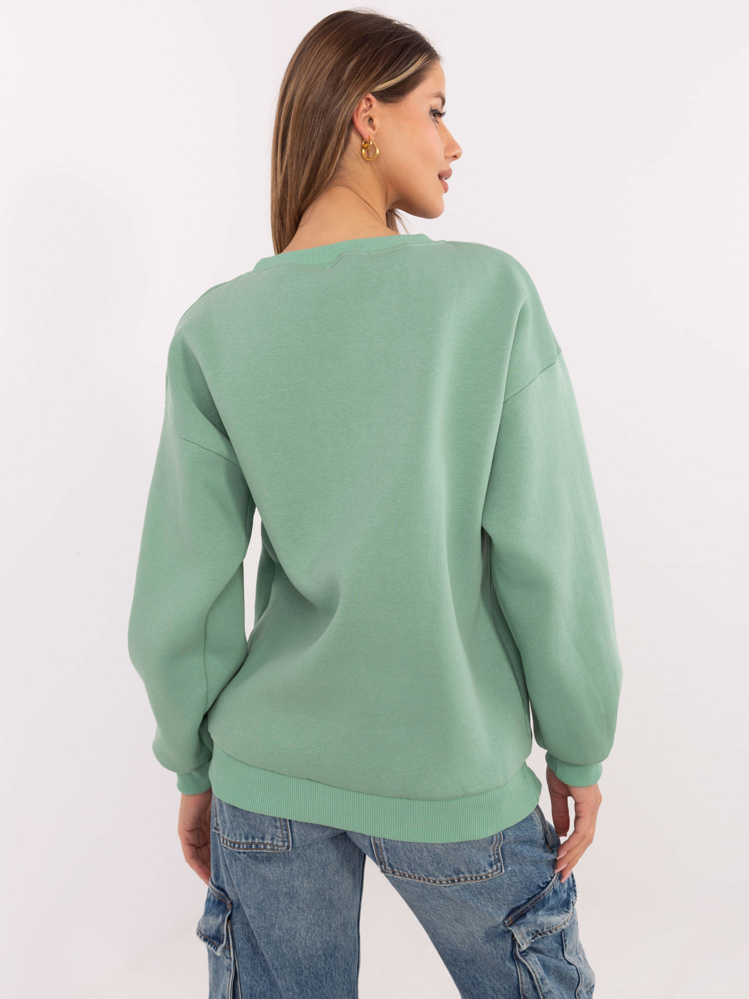 Hurt Pistacjowa bluza bez kaptura z naszywkami