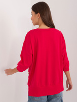 Hurtownia Czerwona damska bluzka z błyszczącym nadrukiem