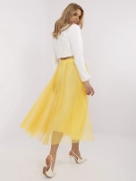 Yellow flared skirt with tulle.
