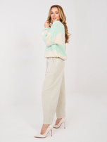 Jasnobeżowe spodnie marchewki z sztruksu