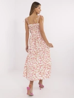 Ecru flared dress with flowers.