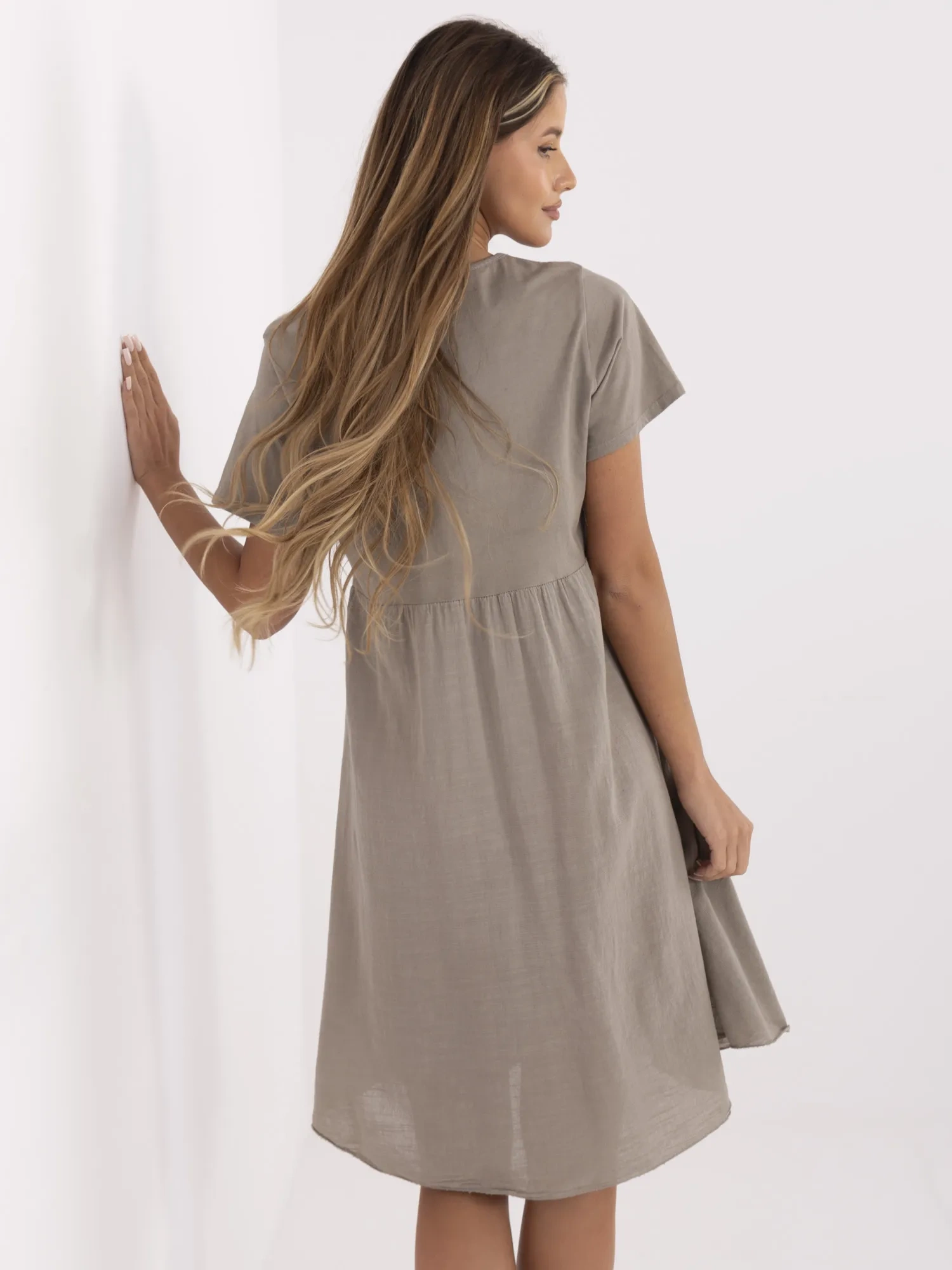 Dark beige summer dress with pockets.