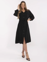 Black muslin dress with a drawstring at the waist.