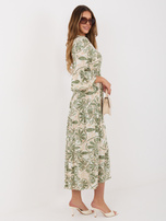 Green summer dress with patterns.