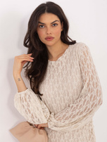 Jasnobeżowa koktajlowa sukienka z koronki