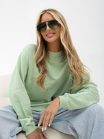 Pistazienfarbener Oversize-Sweatshirt aus Baumwolle.