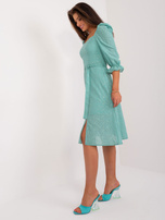 Hurt Mint midi dress with puff sleeves.