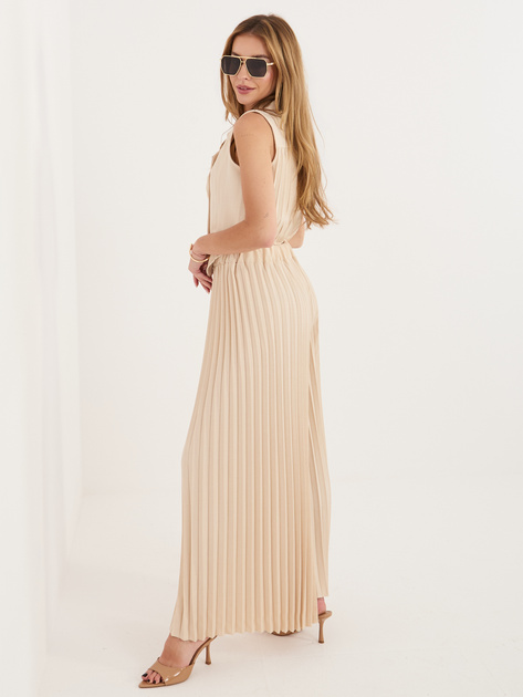 Beżowy damski garnitur z szerokimi spodniami