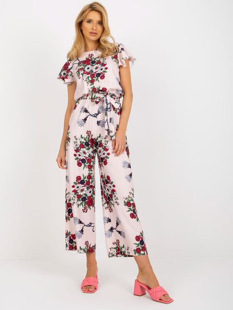 Hurt Jasnoróżowy kombinezon w kwiaty z szerokimi spodniami