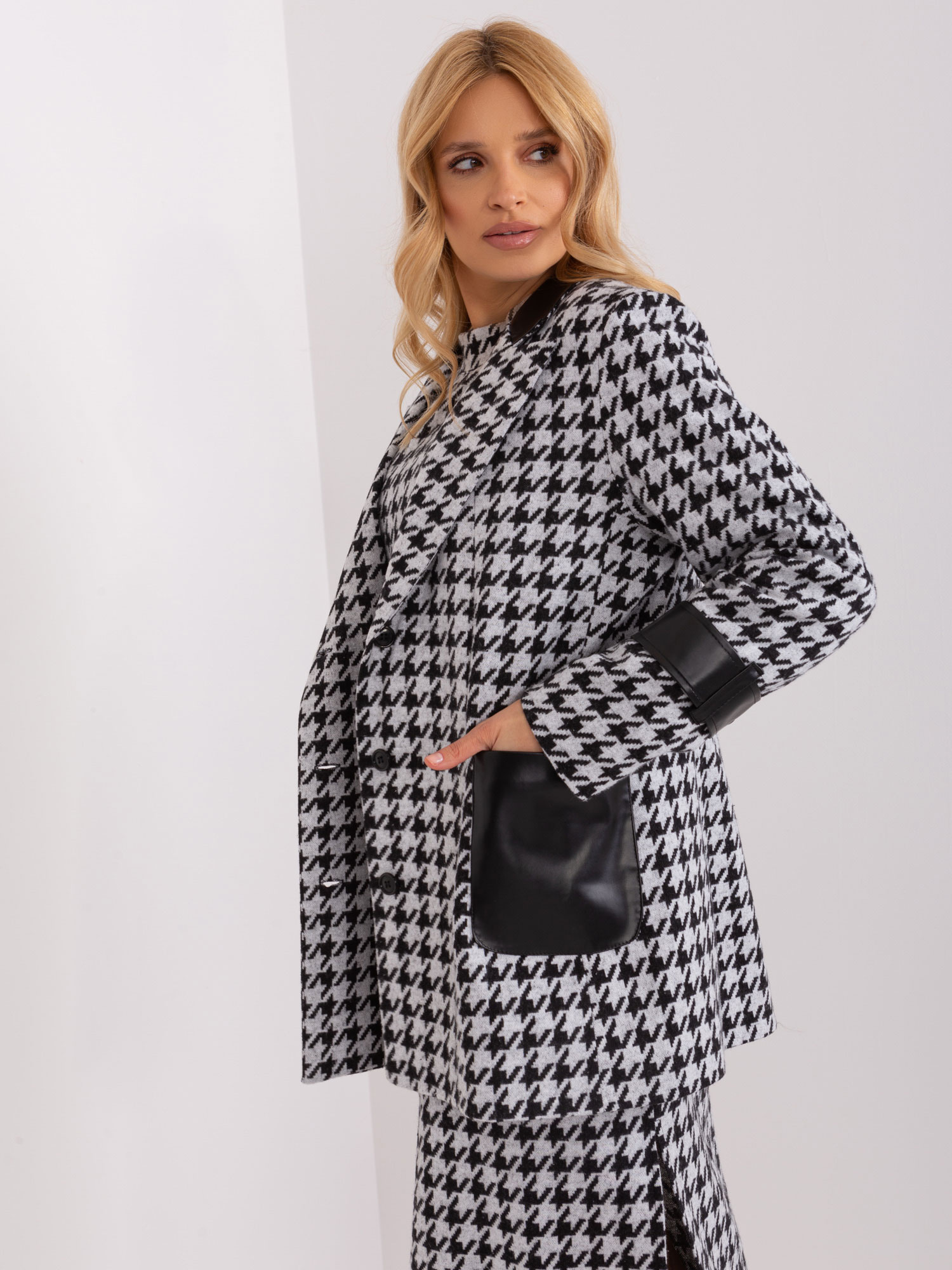 Hurt black-and-white women's jacket in houndstooth.