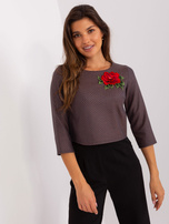 Hurt Granatowa krótka bluzka wizytowa z naszywką 