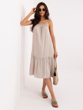 Beżowa rozkloszowana sukienka z falbaną