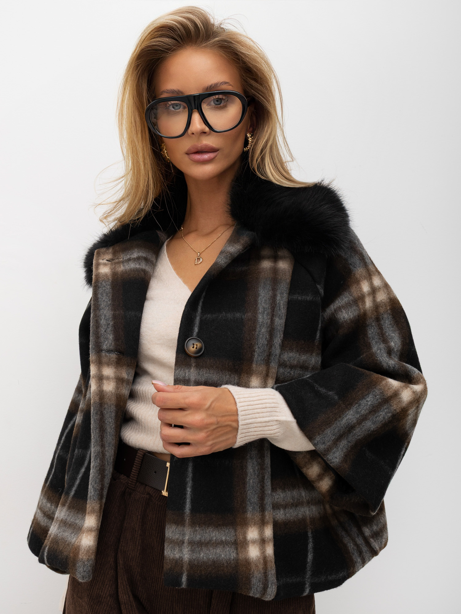 Black short coat with a fur collar.