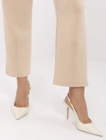 Jasnobeżowe dresowe spodnie basic z kieszeniami 