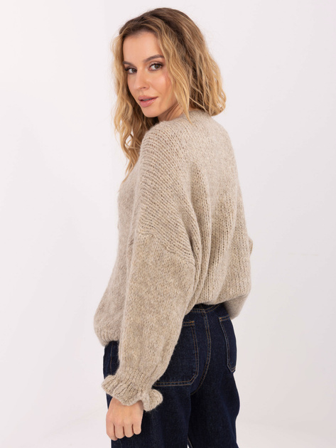 Beżowy kardigan z falbankami przy rękawach