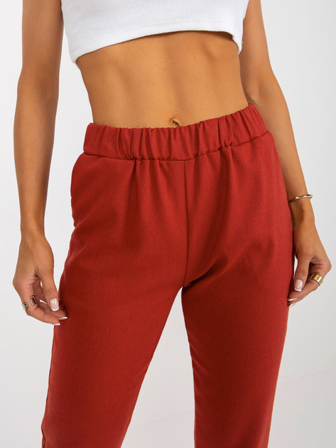 Hurt Ciemnopomarańczowe wełniane spodnie z materiału od garnituru