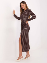 Dark brown draped dress with polka dots.
