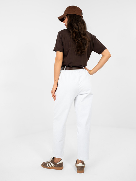 Białe sztruksowe spodnie z kieszeniami