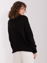 Großhandel Schwarzer Pullover mit Rollkragen im Oversize-Schnitt.