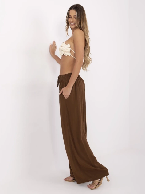 Brązowe zwiewne spodnie z wiązaniem