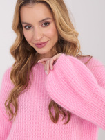 Rosa flauschiger Pullover mit Mohairanteil.