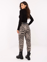 Beżowe damskie spodnie w zebrę