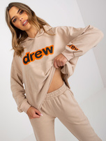Beżowy dwuczęściowy komplet dresowy z nadrukiem