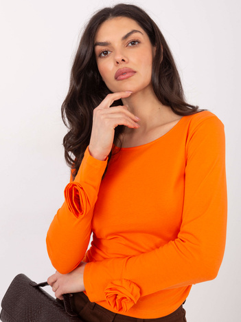 Pomarańczowa bluzka z ozdobnymi różami