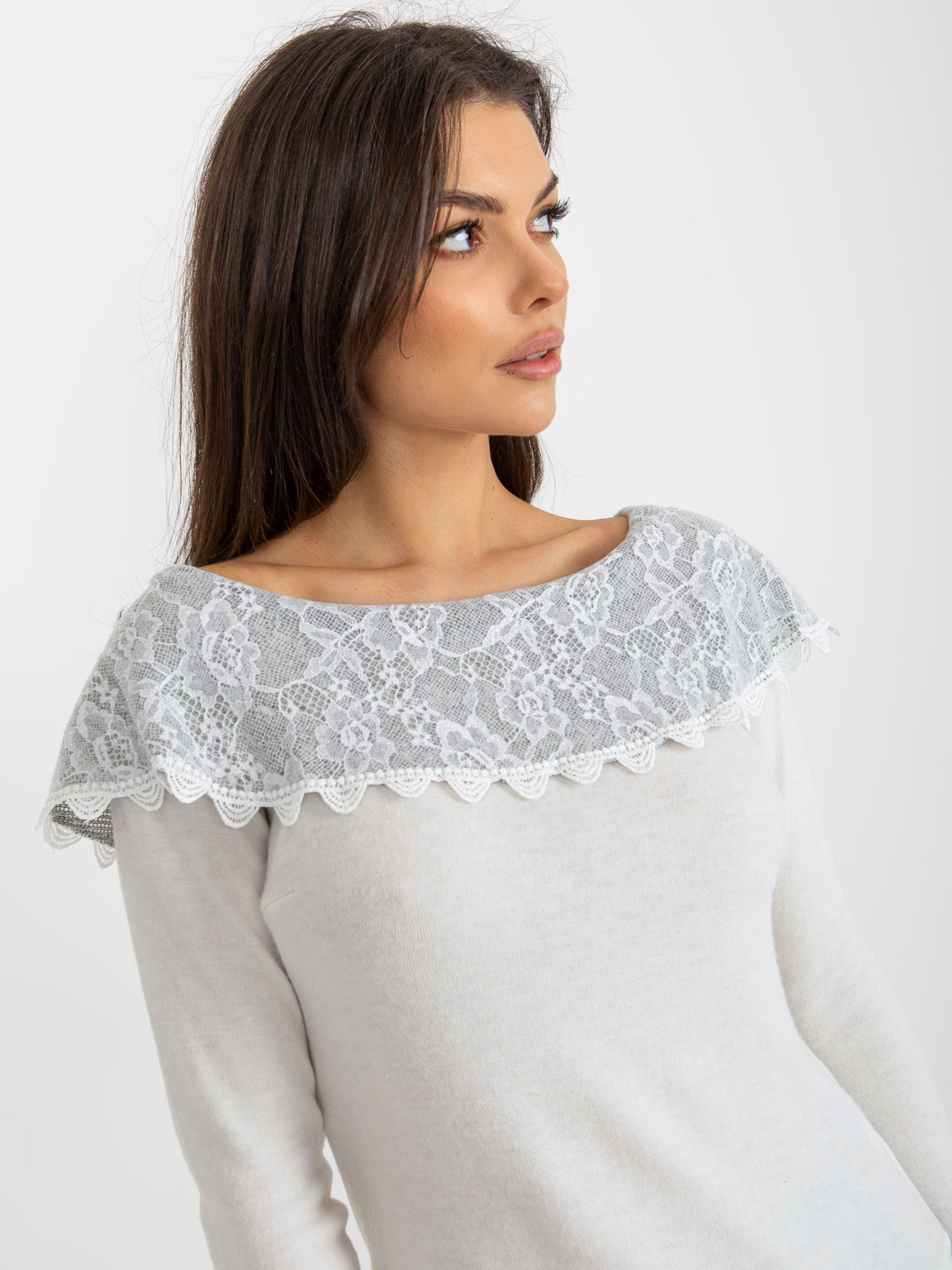 Beige-gray short blouse with exposed shoulders.