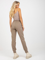 Hurt Ciemnobeżowe damskie spodnie dresowe z kieszeniami