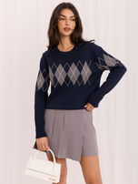 Granatowy damski sweter w geometryczny wzór