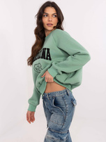 Hurt Pistacjowa dresowa bluza bez kaptura z haftem