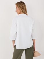 Biała damska koszula z dekoltem V