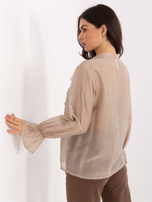 Beżowa przezroczysta koszula z żabotem