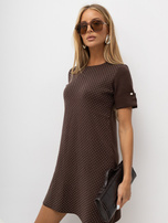 Brown trapeze dress with studs.