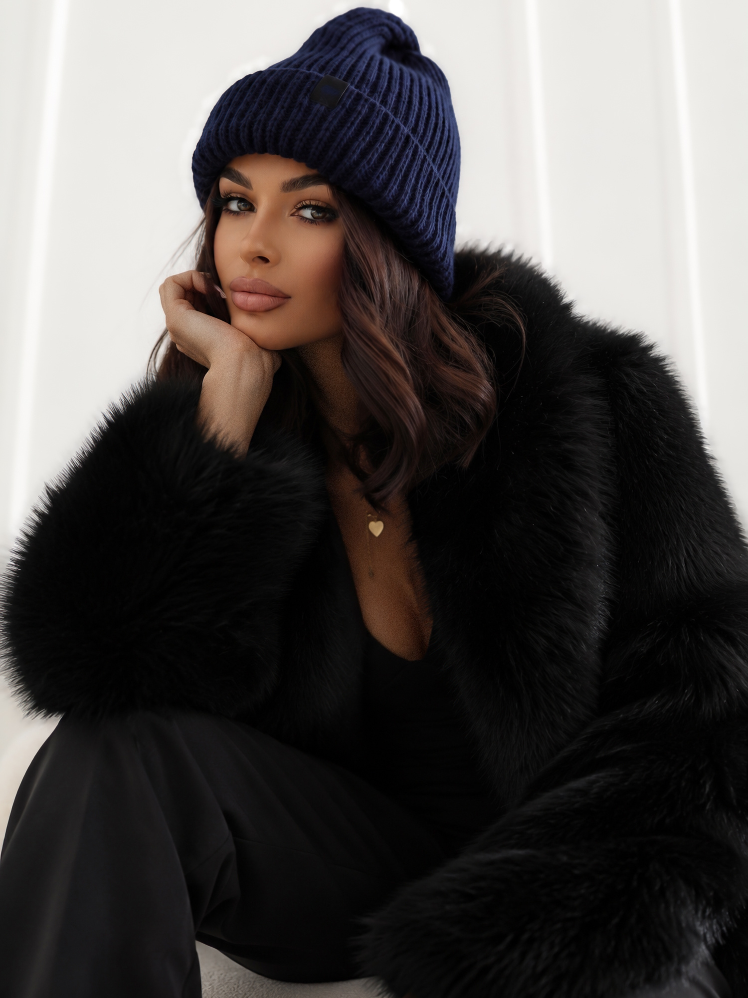 Navy winter beanie hat with a patch.