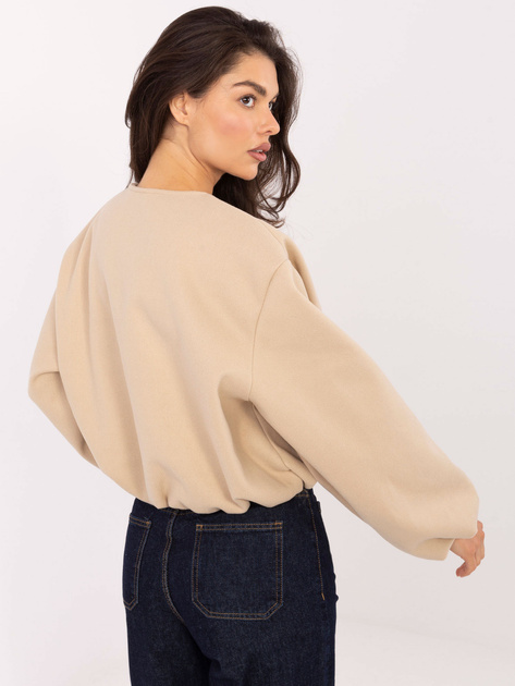 Beżowa przejściowa kurtka typu balloon